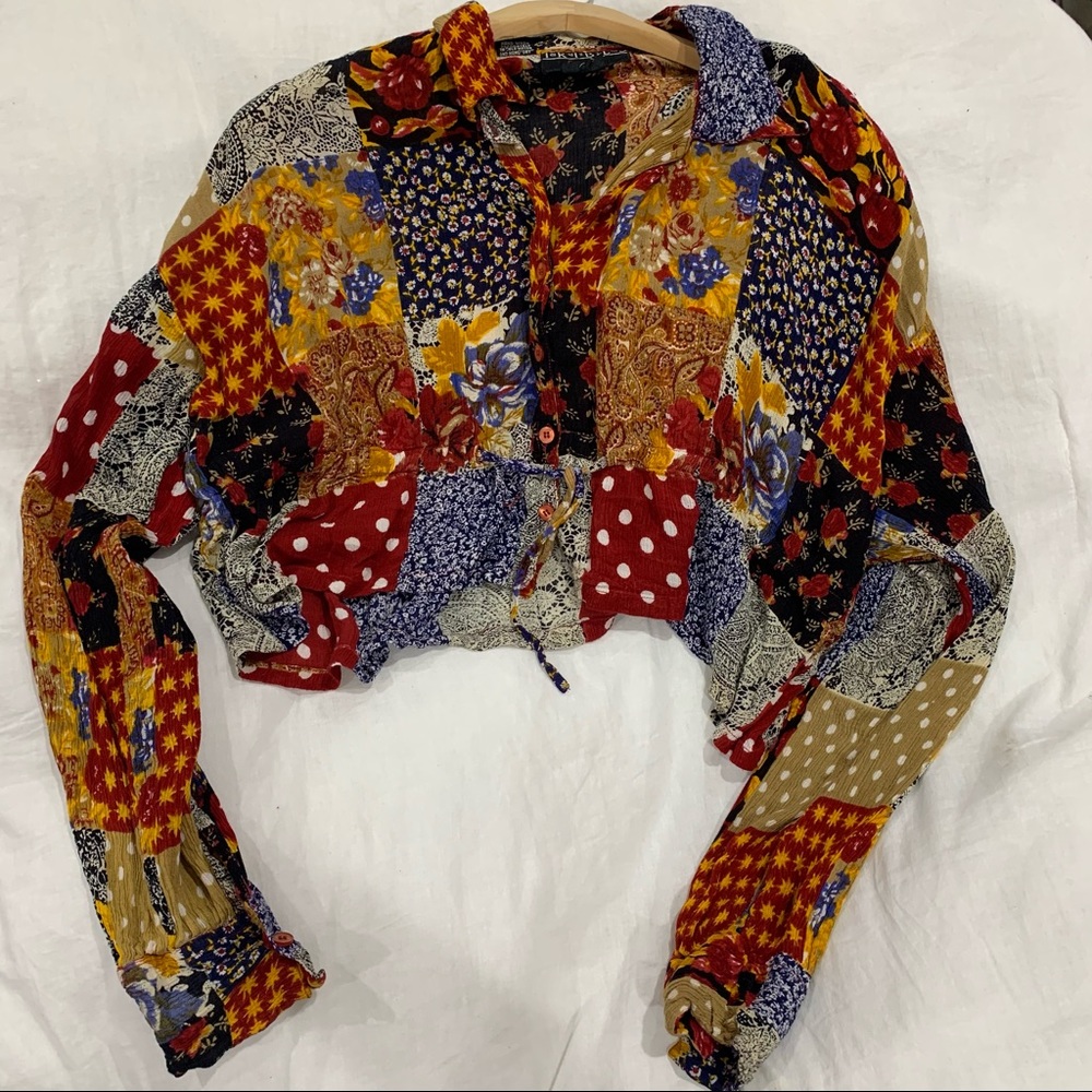 - Tribes Cropped long Sleeve Top